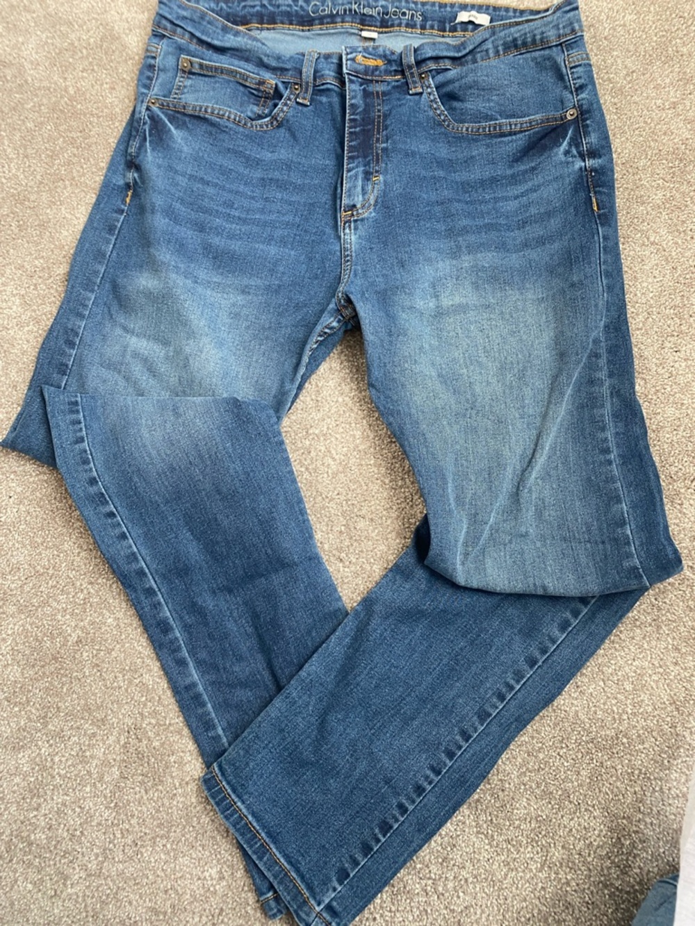 Calvin Klein Jeans Light Blue Denim Jeans with Gold Stitching